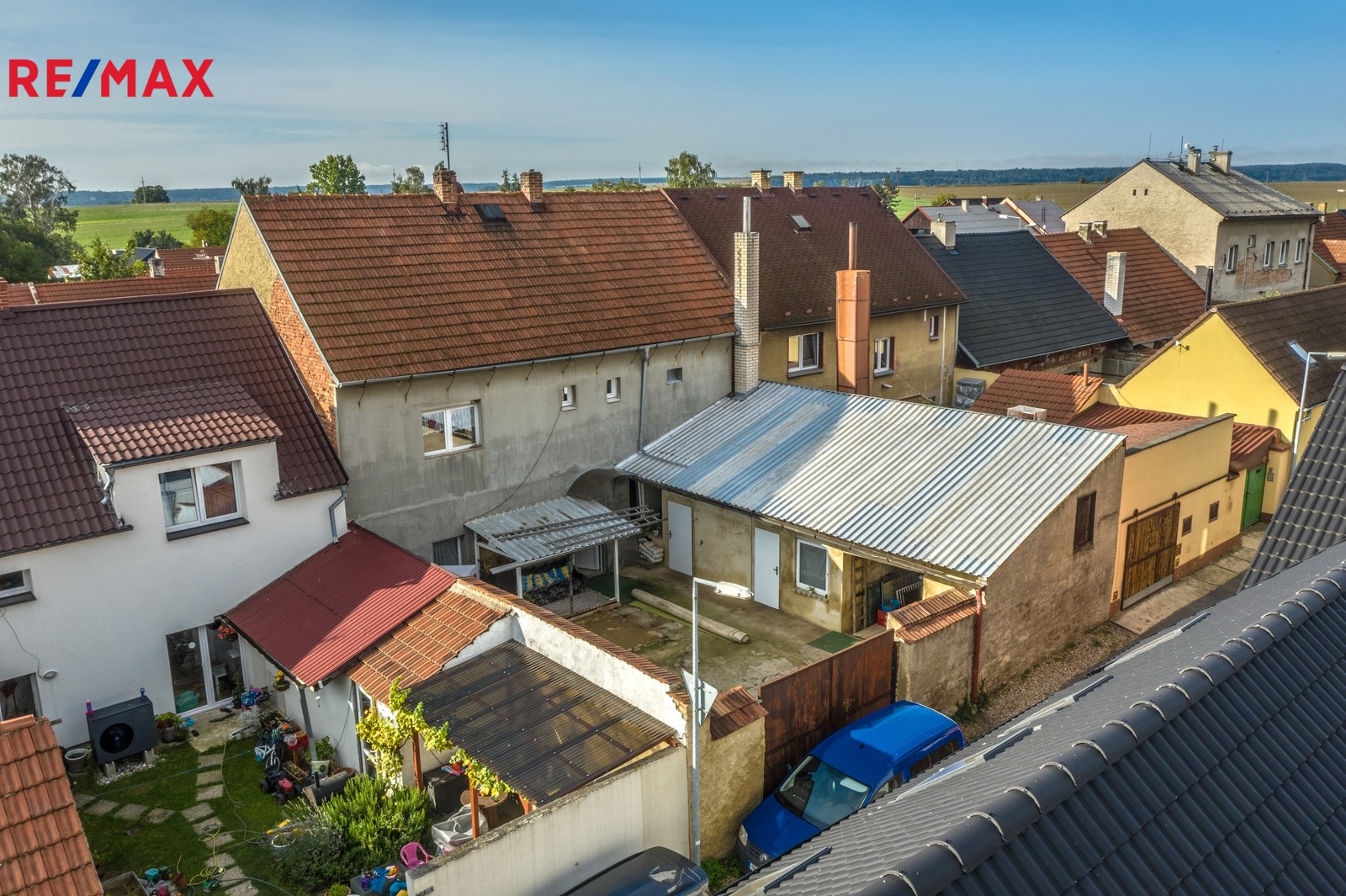 Řadový rodinný dům 5+1 v Tuřanech s dvěma dílnami a zahradou - fotografie 6
